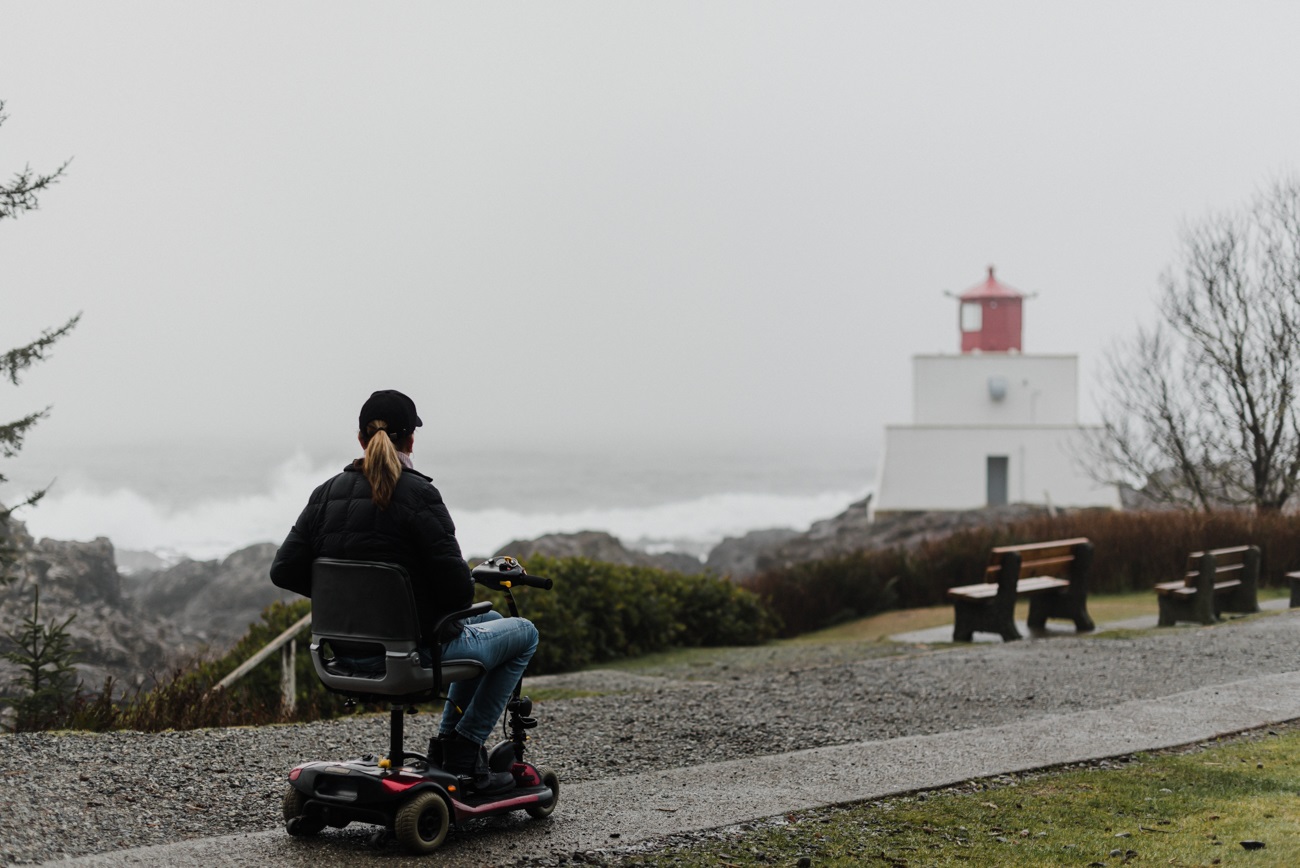 Woman in a wheelchair on the Wild Pacific Trail in Ucluelet | Lexa Bergen